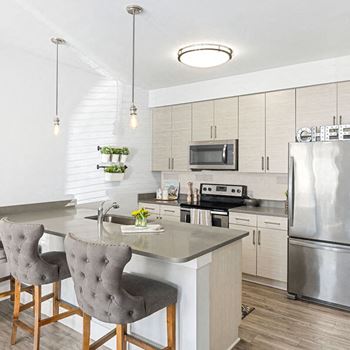 Fitted Kitchen With Island Dining at The Ashley, Charleston, SC, 29407